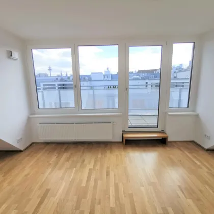 Schöne Dachgeschosswohnung mit Terrasse in zentraler Lage - Bild 3