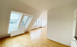 Schöne Dachgeschosswohnung mit Terrasse in zentraler Lage