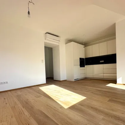 Erstbezug: 2 Zimmer DG-Wohnung mit Balkon - Bild 2