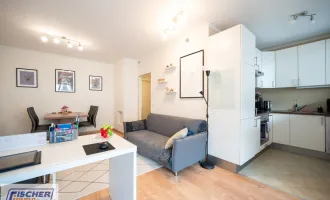 WUNDERSCHÖNE 2 ZIMMER-WOHNUNG mit großer TERRASSE und TIEFGARAGE