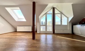 Traumhaftes Wohnen in Hard - 4-Zimmer Dachgeschosswohnung mit Balkon!