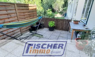 ANLEGER AUFGEPASST - Gemütliche 2-Zimmer-Altbauwohnung mit 13 m² Terrasse, Autoabstellplatz und Gemeinschaftsgarten im Helenental - BEFRISTET VERMIETET