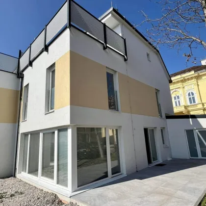Modernes Wohnen mit Garten und Dachterrasse in zentraler Lage in Baden - Bild 2