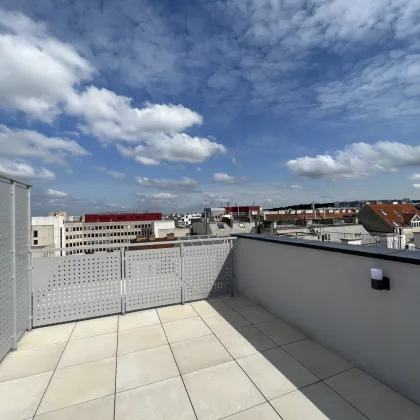 Erstbezug: Helle DG-Wohnung mit atemberaubendem Ausblick und großzügiger Dachterrasse - Bild 2