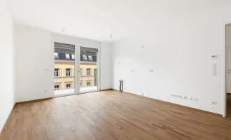 PROVISIONSFREI | Erstbezug |  2-Zimmer Neubau mit Balkon | Fernwärme | TG-Stellplatz optional | Nachhaltiges Wohnbauprojekt