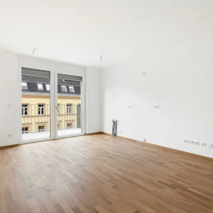 PROVISIONSFREI BIS 31.10.2024 | Erstbezug |  2-Zimmer Neubau mit ca. 7 m² Balkon | Fernwärme | TG-Stellplatz optional | Nachhaltiges Wohnbauprojekt - Bild 3