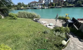 WOHNEN DIREKT AM WASSER! Bungalow mit Blick ins Grüne und direktem Badezugang! Erholung pur! Voll möbliert!