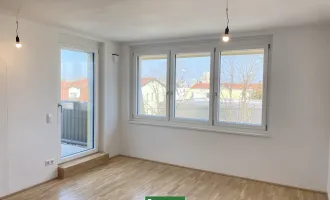 Unbefristete Neubau-Dachgeschosswohnung in Essling mit Einbauküche, Waschtrockner und großer Terrasse!