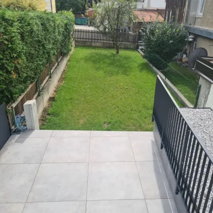 FAMILIENFREUNDLICHE 4-ZIMMERWOHNUNG MIT TERRASSEN UND GARTEN - Bild 2