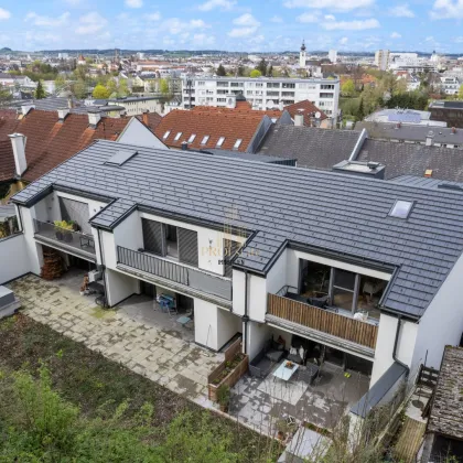 Profitables Investment: Ertragsobjekt - 3 vermietete Wohnungen mit Garten und 6 Garagen in Thalheim bei Wels um Netto 1.060.000!                  346 m² Nutzfläche - Bild 2