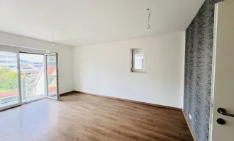 Drei-Zimmer-Wohnung mit Balkon und Tiefgaragenstellplatz