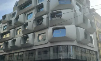 Exklusive Geschäftsfläche zur Miete in Grazer Altstadt – Architektonischer Leuchtturm von Zaha Hadid