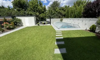 Exklusives Wohnvergnügen - Modernes Einfamilienhaus mit gepflegtem Garten und luxuriöser Ausstattung