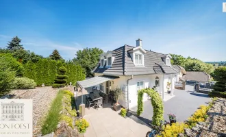 Wunderschöne Landhausstil-Villa eingebettet in einem idyllischen Gartenparadies mit Schwimmteich und Whirlpool