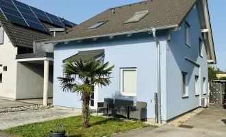 Exklusive Wohnidylle: Einfamilienhaus in Breitenlee mit großem Garten, Terrasse und Schwimmbecken