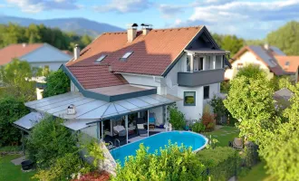 Familienparadies in Villach: Haus mit Pool, Wintergarten und gepflegtem Garten