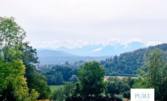 TRAUMHAFTER KARAWANKENBLICK! Attraktives Hanggrundstück bei Velden!