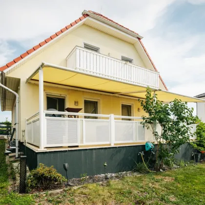 Urlaubsfeeling inklusive! Modernes Einfamilienhaus mit Balkon, Terrasse und Garten in Gated Community mit idyllischem Badesee - Bild 3