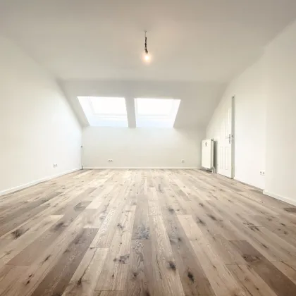 NEU! ERSTBEZUG! Ideale rd. 57 m² große 1,5 Dachgeschosswohnung! Zentrale Lage! - Bild 2