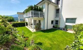 Neuwertige Wohnung mit Garten. Schöner Bergblick. Seeboden. Dem See so nah.