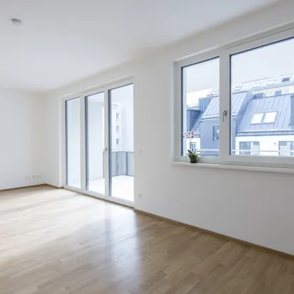 Moderne 3-Zimmer-Neubauwohnung mit großzügigem Balkon zum ruhigen Innenhof! - Bild 2