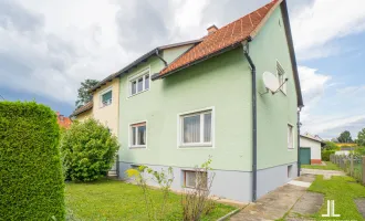 Vollunterkellerte Doppelhaus-Hälfte mit Garage und großem Garten in ruhiger Wohnlage