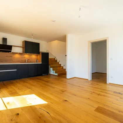 Luxuriöse 4 Zimmer Wohnung inkl. hochwertiger Einbauküche und Garagenstellplatz - NEUBAU - BEFRISTET VERMIETET ca. 3,1% Rendite - Bild 3