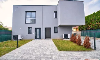 Erstbezug im Grünen: Moderne Doppelhaushälfte mit großzügigem Garten und 2 Stellplätzen.