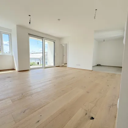 Modernes Wohnen im Grünen: 2-Zimmer Wohnung mit Balkon & Erstbezug in 1220 Wien für nur 325.600,00 €! - Bild 2