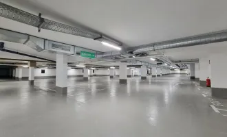 Tiefgaragenparkplatz mit optionaler E-Ladestation beim Traisenpark zu mieten