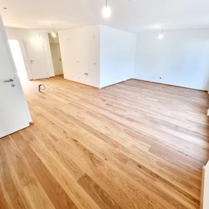 Ihre Suche hat ein Ende... Clever und nachhaltig investieren! Perfekt aufgeteilte 4-Zimmer Wohnung mit Riesenterrasse! Erdwärme + Ruhelage + Tiefgarage + Ideale Ost-West Ausrichtung! - Bild 3