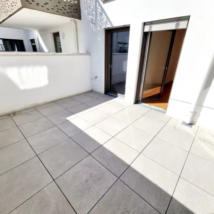 Absolute Ruhelage mit Terrasse im Innenhof! Innovative Erdwärme + Perfekt aufgeteilte 3 Zimmer + Hochwertige Ausführung + Tiefgarage + Nachhaltig investiert! Jetzt zugreifen! - Bild 3