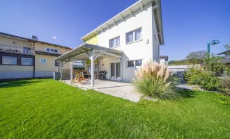 Traumhaftes Wohnen in idyllischer Lage: Modernes Haus mit Garten, Terrasse und Solarenergie