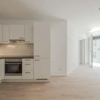 VIDEOTOUR: 2 Zimmer Neubauwohnung mit Balkon in beliebter Wohngegend, hofseitig! Ab 1.1.25! - Bild 2