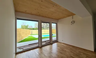 Erstbezug, schlüsselfertige Neubauwohnung mit Eigengarten und Pool Top 5