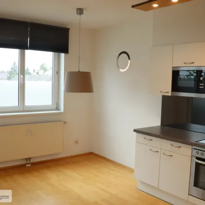 Moderne  2 Zimmer  mit wunderschönem überdachten Balkon im  Zentrum - Bild 3