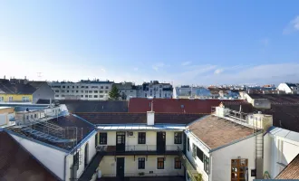 Weitblick, Ruhe & zentrale Lage – Sonnige Altbauwohnung mit Balkon