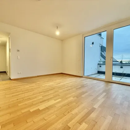 ERSTBEZUG! Moderne 2-Zimmer-Wohnung - ca. 58,66m² NFL - Loggia - Bild 2