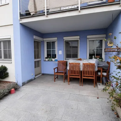 Traumhafte 4 Zimmerwohnung mit Garten und Tiefgaragenplatz - Bild 2